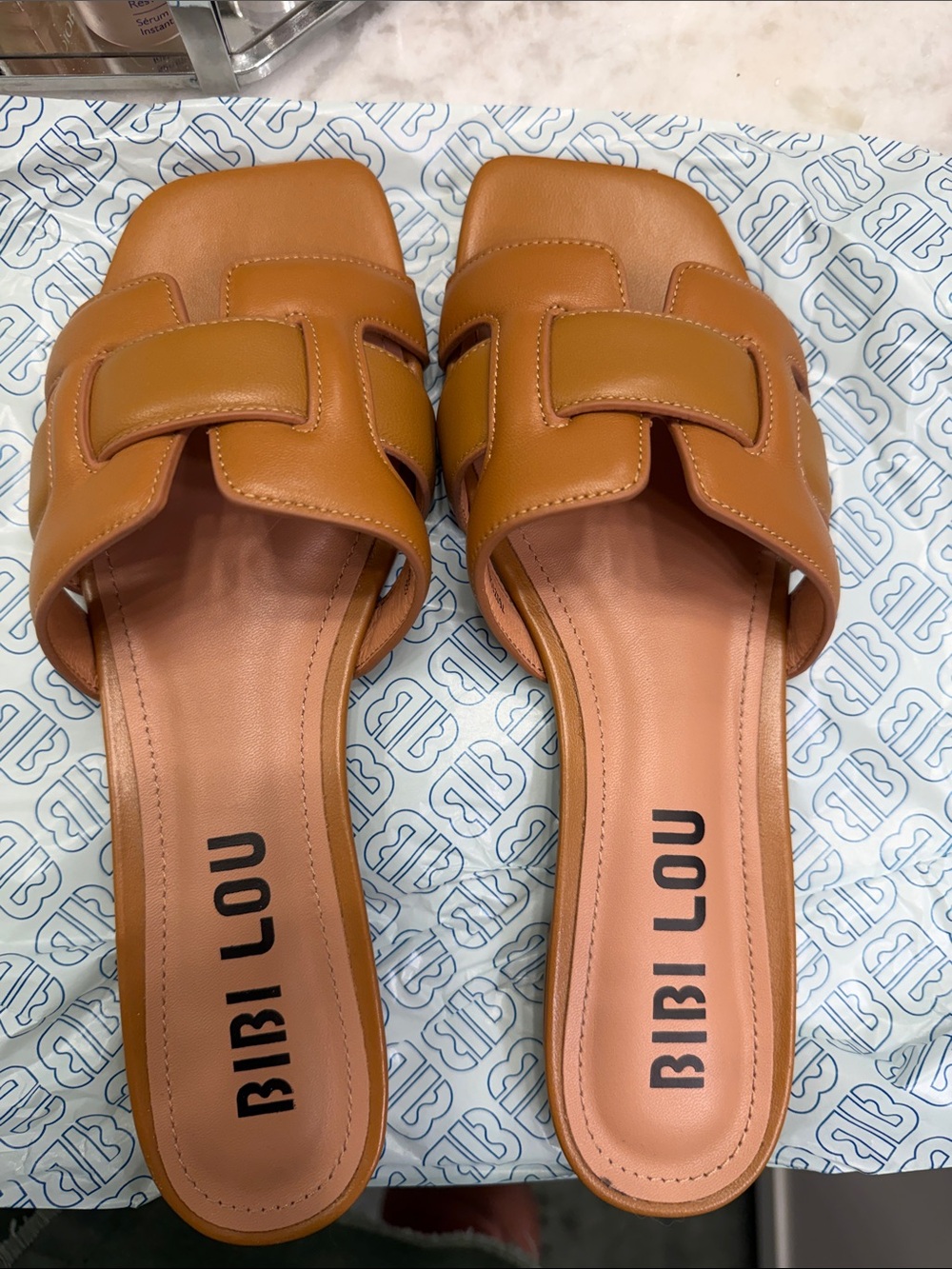 Bibi Lou Tan Leather Slide Sandals — Casual Interlock Strap
